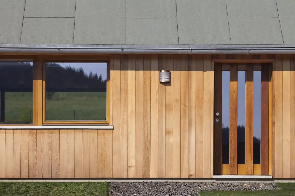entrance doors in the new wooden house